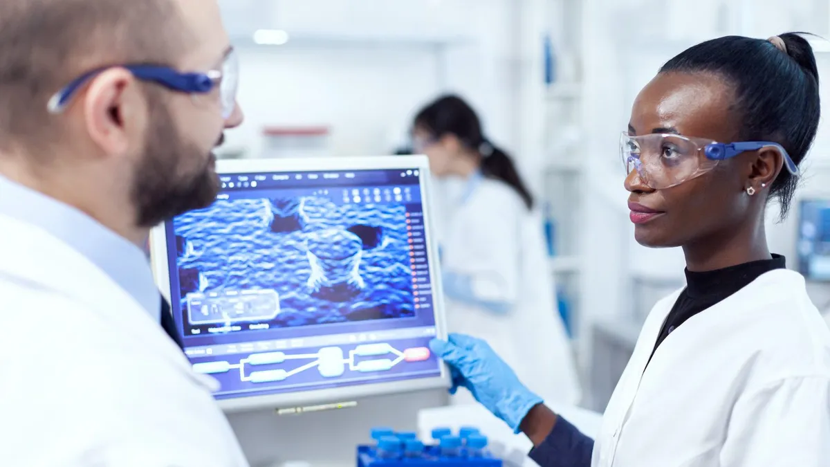 Scientist running an experiment in a research laboratory